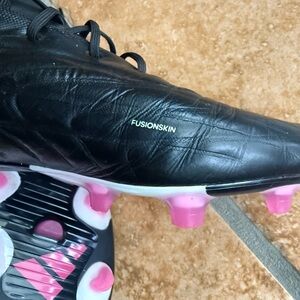 Black Soccer Cleats with Pink Accents